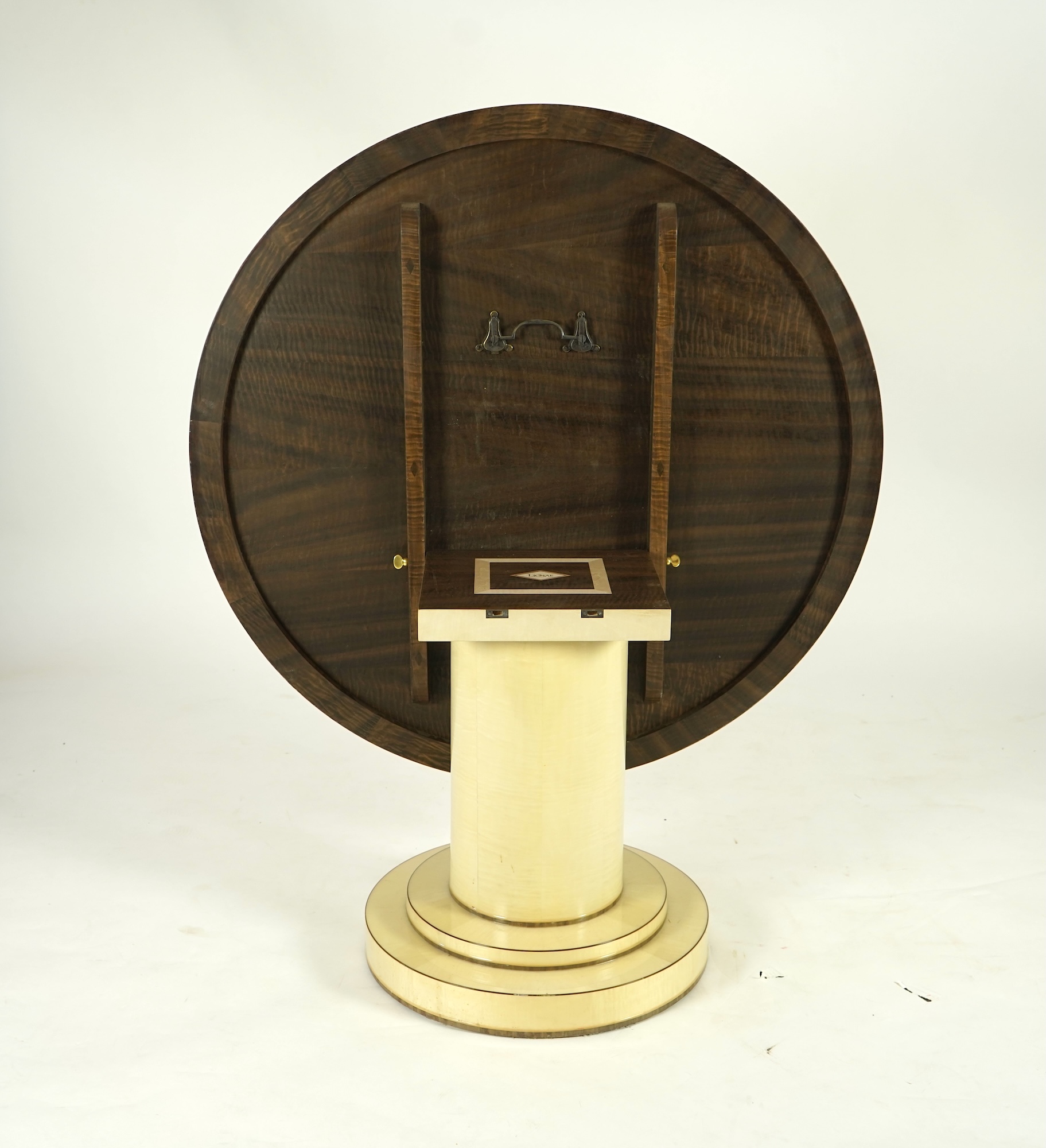 Lignae: A contemporary chrysanthemum and specimen wood inlaid circular tilt top centre table